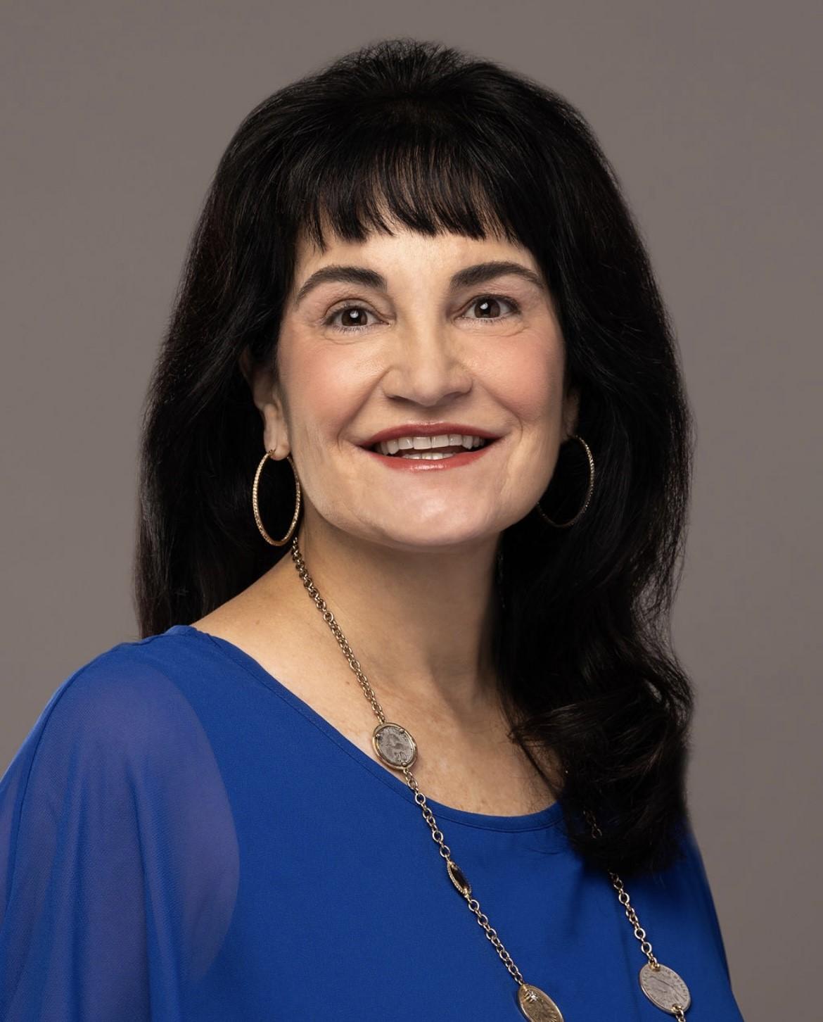 Claudine West